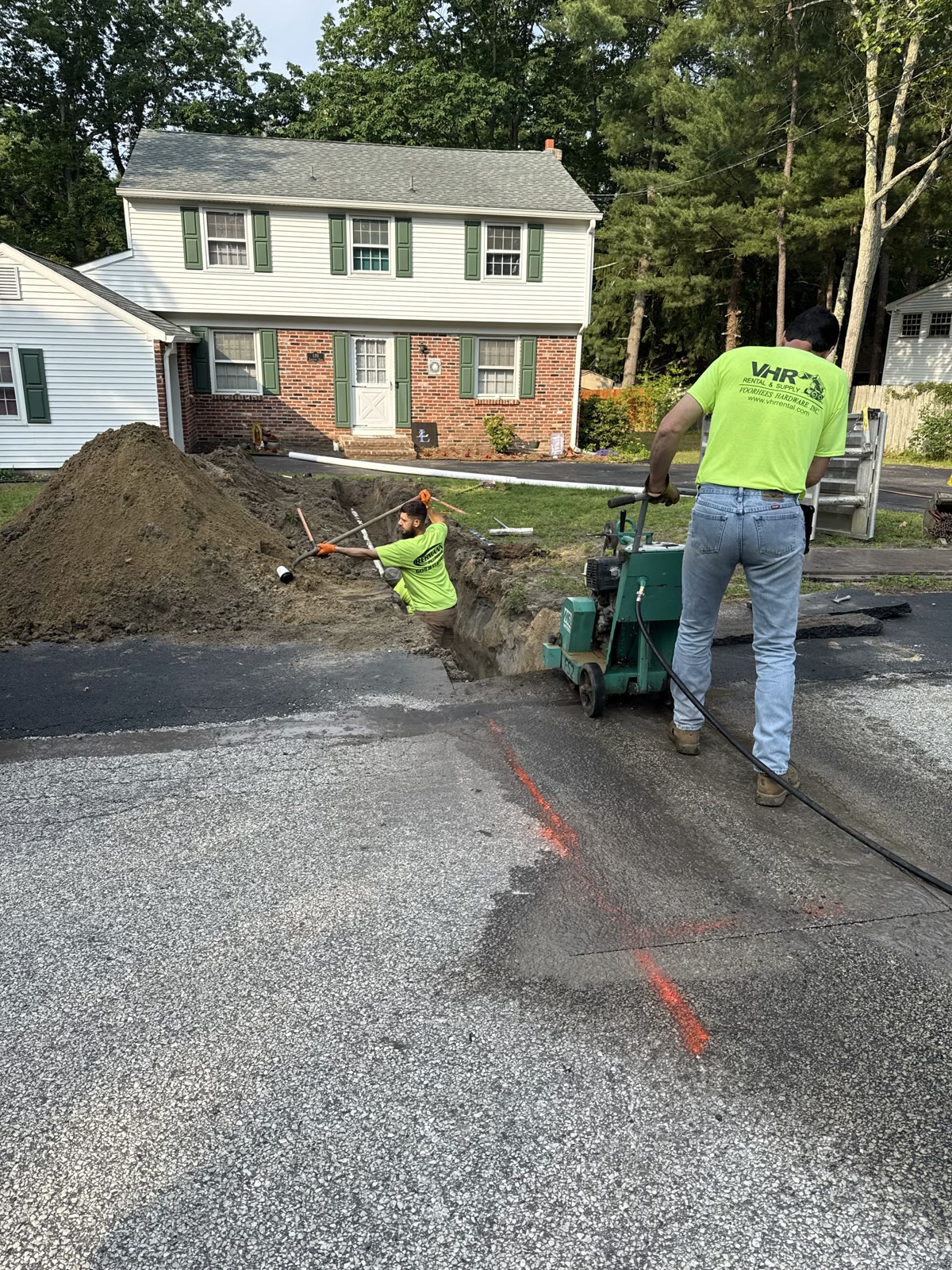 Service truck parked for residential plumbing work